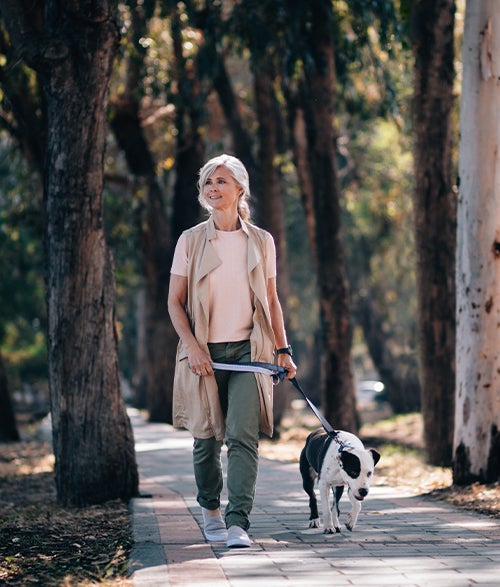 Woman walking her dog